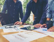 Manual meeting notes feel harmless. Someone volunteers to take them, a document gets shared, and everyone moves on.